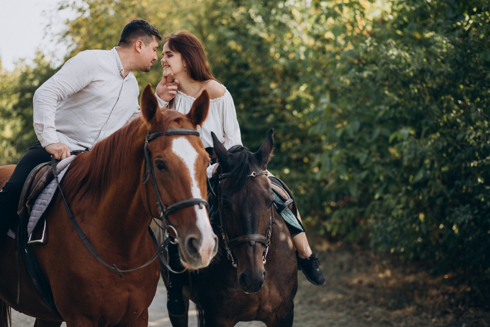 Couple Riding Horses